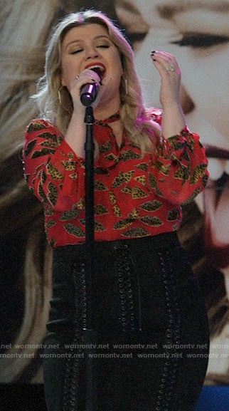 Kelly Clarkson's red leopard lips blouse and lace-up skirt on The Morning Show
