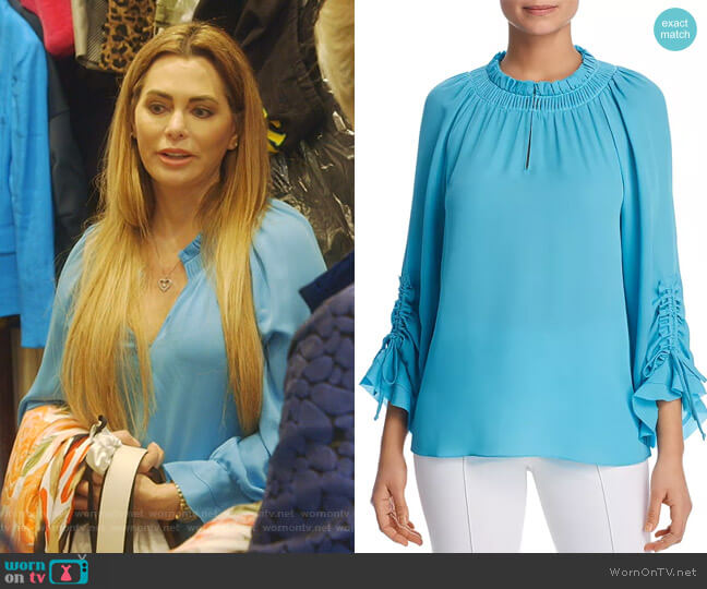 Ramone Silk Blouse by Kobi Halperin worn by D’Andra Simmons  on The Real Housewives of Dallas