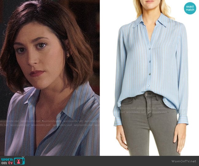 Sydney’s blue striped button down blouse on Bluff City Law