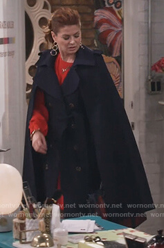 Grace’s navy double breasted cape coat on Will and Grace