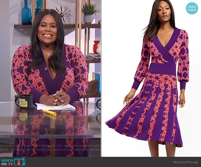 Link-Print Wrap Sweater and Pleated Sweater Skirt by New York & Company worn by Nina Parker on E! News