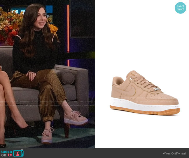 Esther Povitsky’s blush sneakers on A Little Late with Lilly Singh