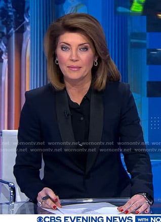 Nora’s navy contrast shawl collar blazer on CBS Evening News