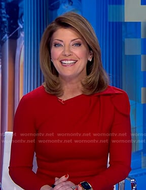 Norah’s red gathered shoulder dress on CBS Evening News