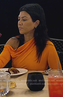 Kourtney’s orange drape mini dress on Keeping Up with the Kardashians