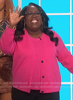 Sheryl’s pink cardigan and tank top on The Talk