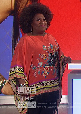 Sheryl’s red floral poncho top on The Talk