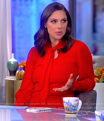 Abby’s red tie neck sweater on The View