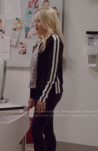 Roxy's black and white track jacket on Almost Family