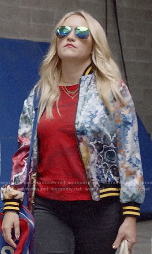 Roxy’s red camo tee and printed bomber jacket on Almost Family
