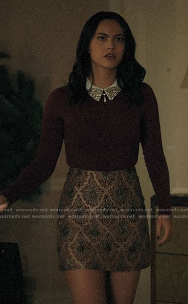 Veronica’s red sweater with embellished collar and patterned skirt on Riverdale