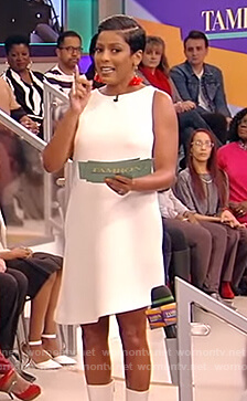 Tamron’s white asymmetric dress on Tamron Hall Show