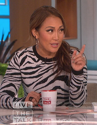 Carrie’s white embellished zebra stripe sweater on The Talk