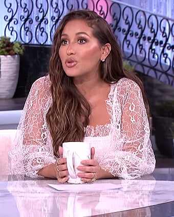 Adrienne's white lace trim dress on The Real