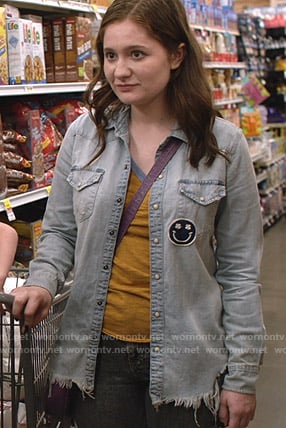 Debbie’s blue distressed shirt with smiley patch on Shameless