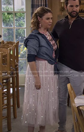 Kimmy's pink Serious Business Woman tee and sequin striped skirt on Fuller House