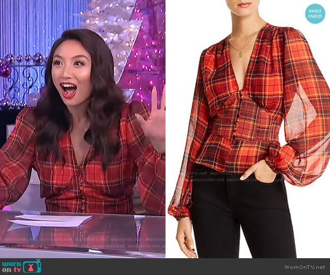 Taylor Balloon-Sleeve Plaid Top by Lini worn by Jeannie Mai on The Real