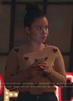 Mariana's beige heart sweater on Good Trouble