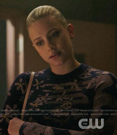 Betty’s purple floral and striped sweater on Riverdale