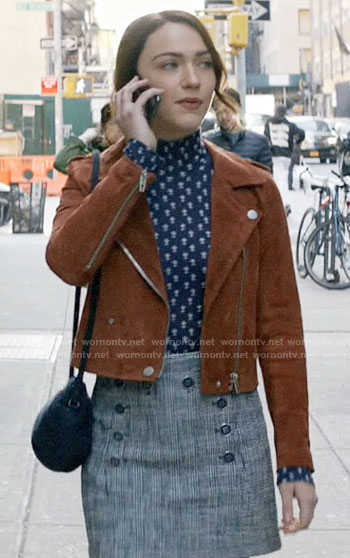 Cara's navy floral top, button detail skirt, and suede moto jacket on God Friended Me
