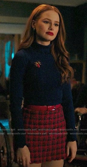 Cheryl’s blue turtleneck and red check skirt on Riverdale