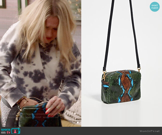 Clare V Midi Sac in Evergreen Snake with Cerulean worn by Roxy Doyle (Emily Osment) on Almost Family
