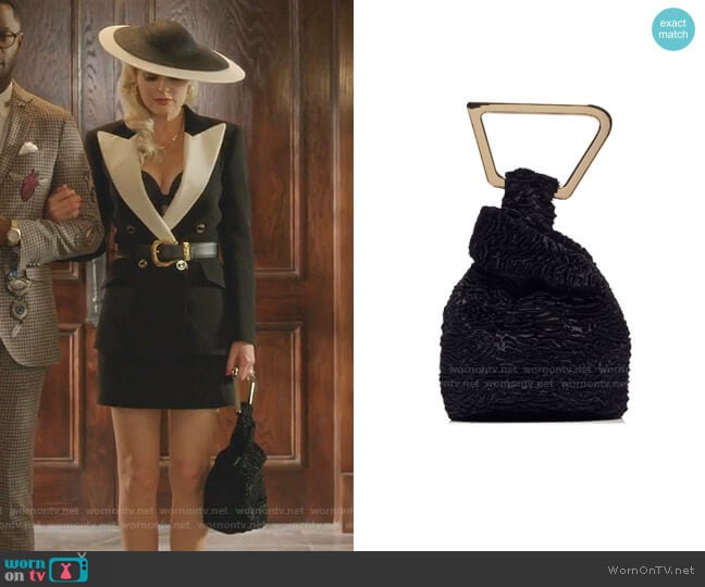 Astraea Faux Fur Top Handle Bag by Cult Gaia worn by Alexis Carrington (Elaine Hendrix) on Dynasty