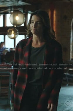 Dex’s red plaid coat on Stumptown