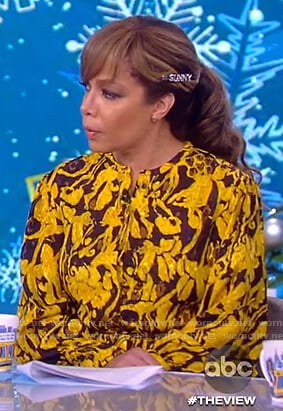 Sunny’s yellow floral jacquard blouse on The View