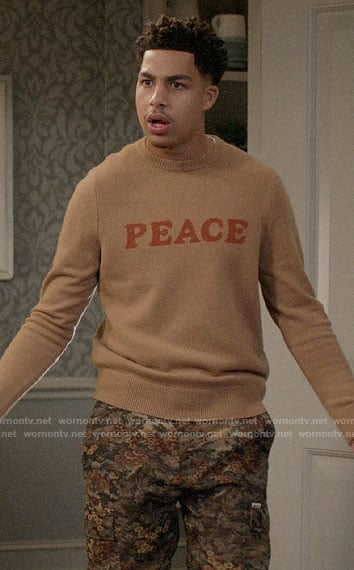 Junior's PEACE sweater on Black-ish