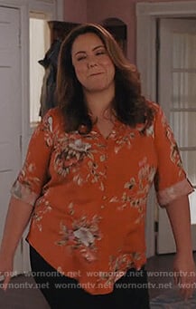 Katie's orange blouse blouse on American Housewife