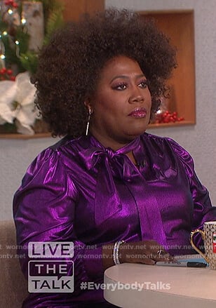 Sheryl’s purple metallic blouse on The Talk