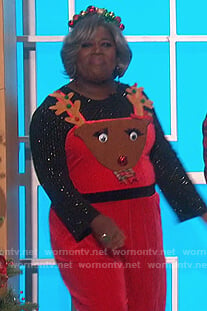 Sheryl’s red reindeer jumpsuit on The Talk