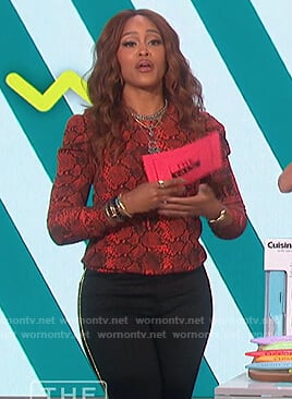 Eve’s red snakeskin sweatshirt on The Talk