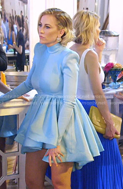 Stephanie’s blue ruffle mini dress on The Real Housewives of Dallas