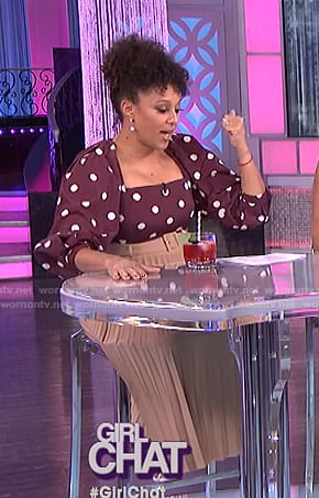 Tamera's purple polka dot top and beige pleated skirt on The Real