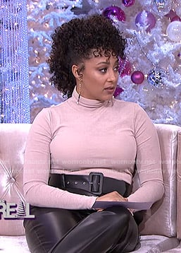 Tamera’s turtleneck sweater and black belted leather pants on The Real