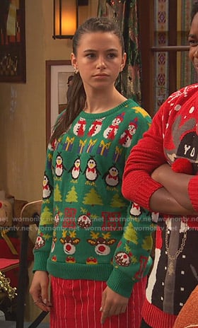 Tess’s green ugly christmas sweater on Ravens Home