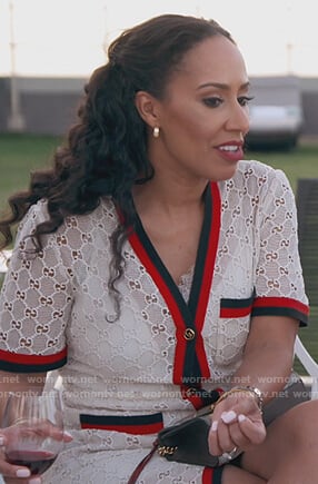 Tanya Sam’s white lace dress with stripe trim on The Real Housewives of Atlanta