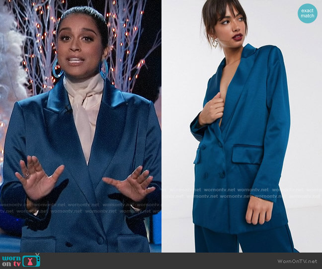 Lilly Singh’s blue satin double-breasted blazer on A Little Late with Lilly Singh