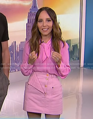 Lilliana’s pink blouse and mini skirt on E! News