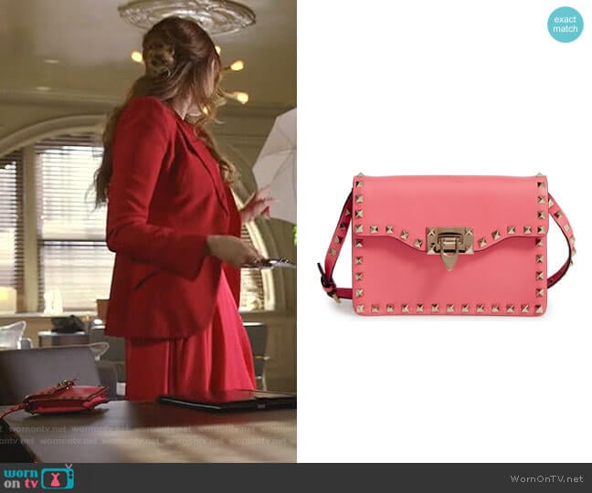 Rockstud Leather Crossbody Bag by Valentino Garavani worn by Fallon Carrington (Elizabeth Gillies) on Dynasty