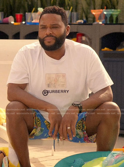 Andre's Burberry graphic tee and blue printed board shorts on Black-ish