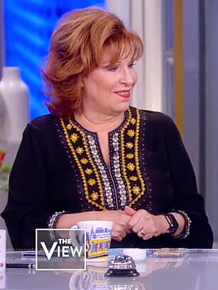 Joy’s black embellished trim blouse on The View