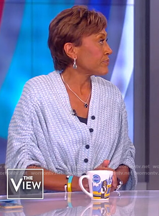 Robin Robert’s blue knit button down sweater on The View