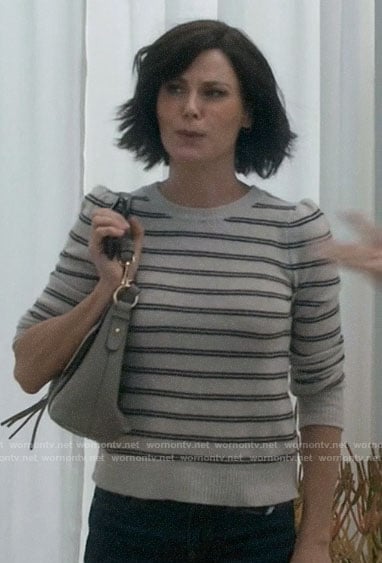 Claire’s striped sweater on Modern Family