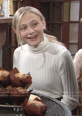 Faith's white ribbed turtleneck sweater on The Young and the Restless