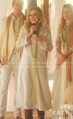 Fallon's white and gold embroidered linen dress on Dynasty