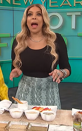Wendy's green snakeskin print skirt and top on The Wendy Williams Show