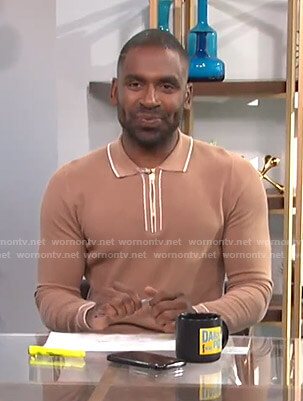 Justin’s camel knit polo on E! News Daily Pop